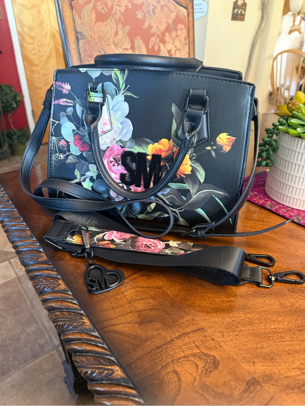 SM Black Floral Satchel Handbag with 2 Detachable Straps and carry handles.
